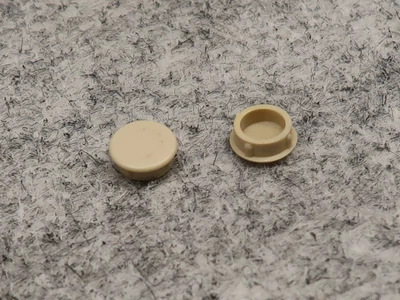 Csavartakaró gomb szürke